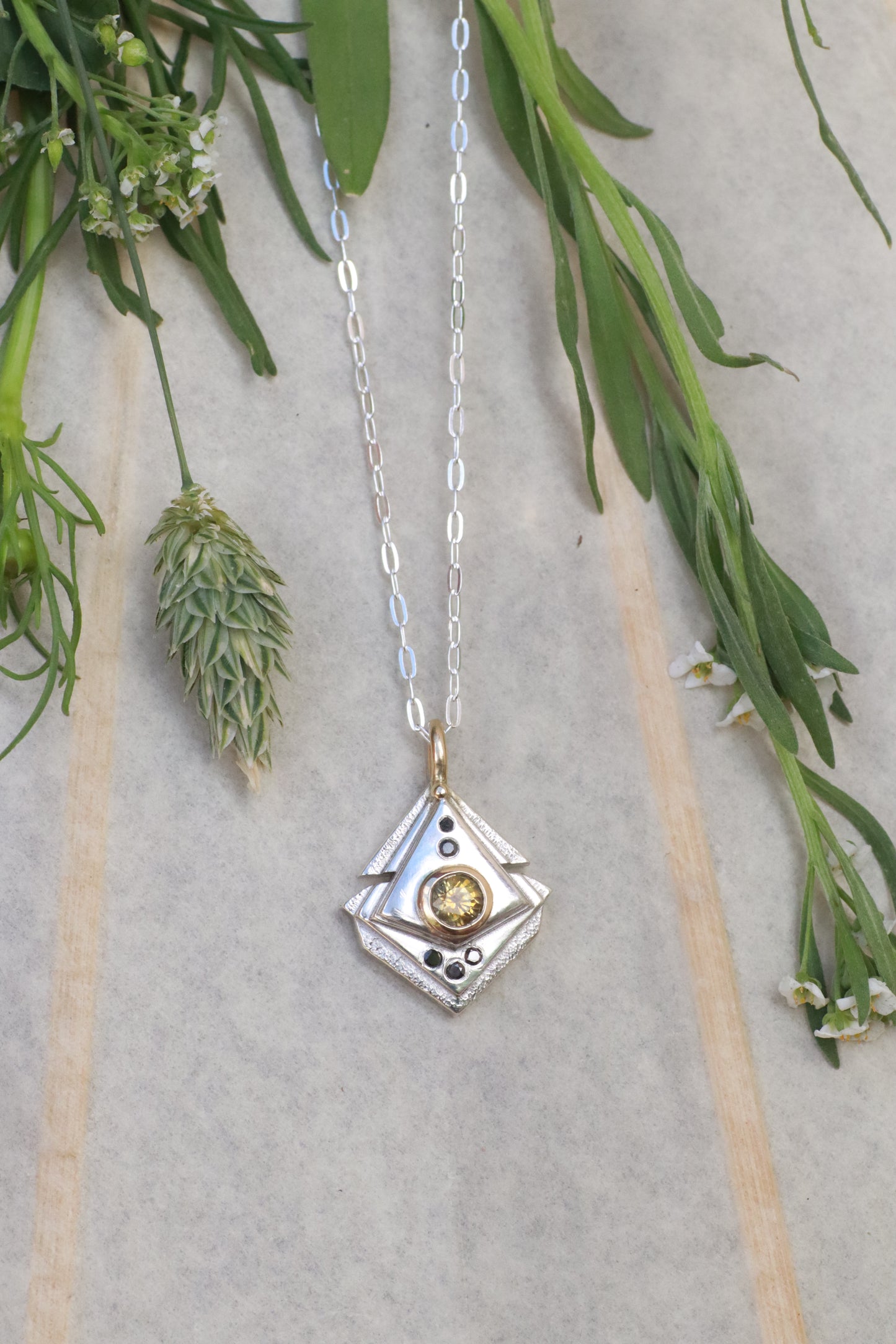 Black and Gold Montana Sapphire Amulet